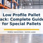 Yellow low profile pallet jack in a warehouse aisle beside pallet racking stocked with boxes